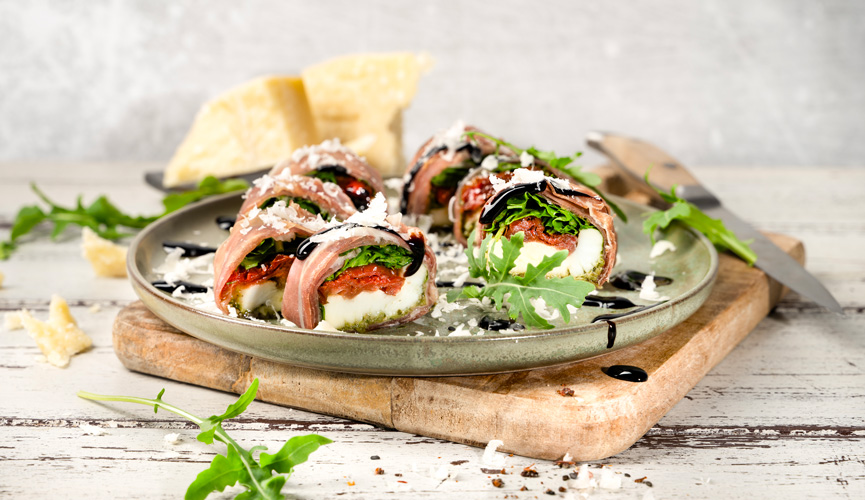 Italienisches Sushi mit Parmaschinken Italienisches Sushi mit Parmaschinken